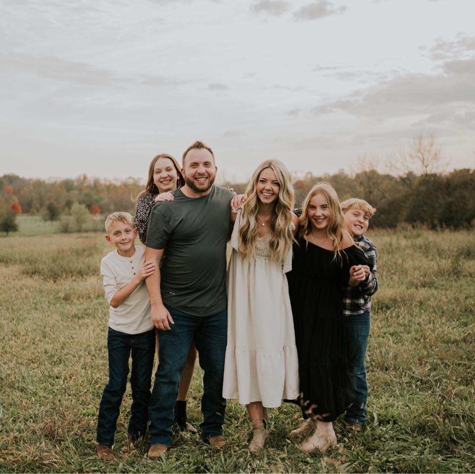 Zach Tipton with his wife Danielle and four children